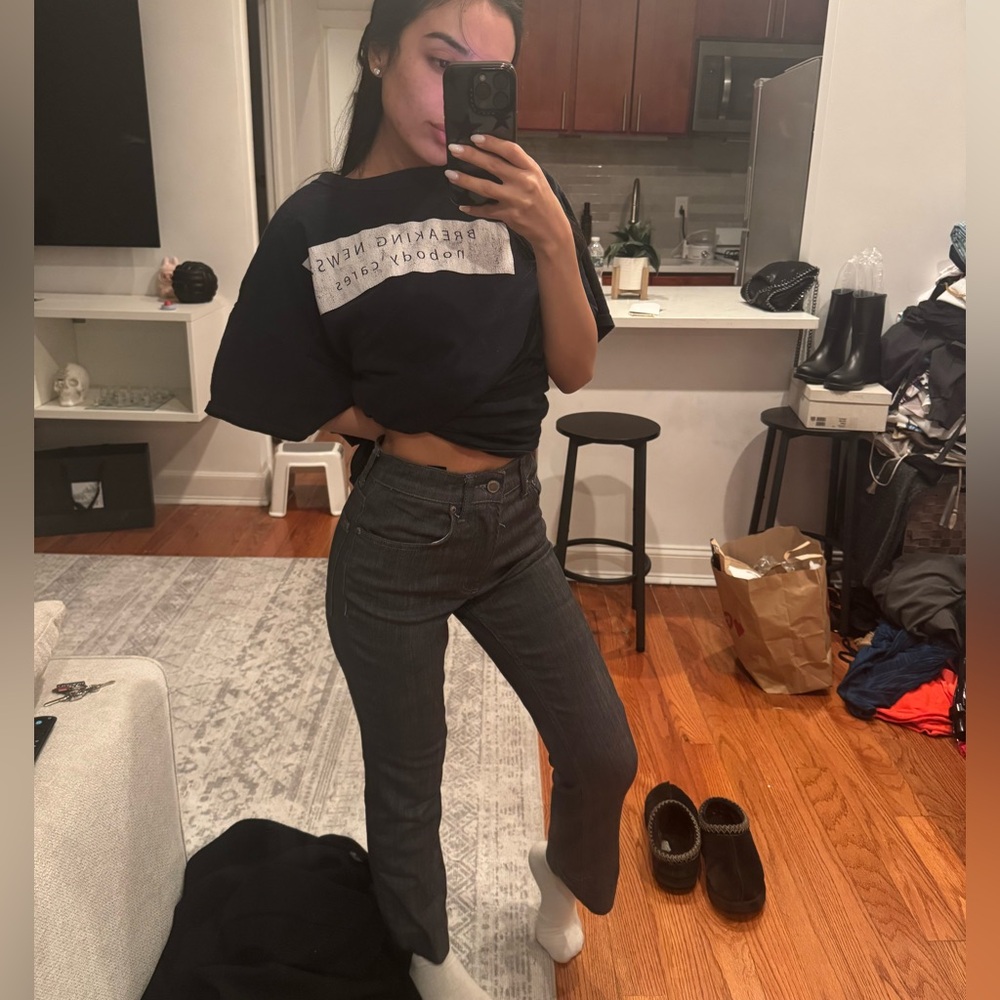 Black Graphic T-Shirt and Gray Jeans